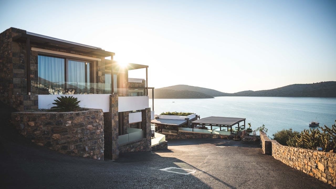 services-03 Elegant modern house by the lake with stunning sunrise view. Ideal real estate.